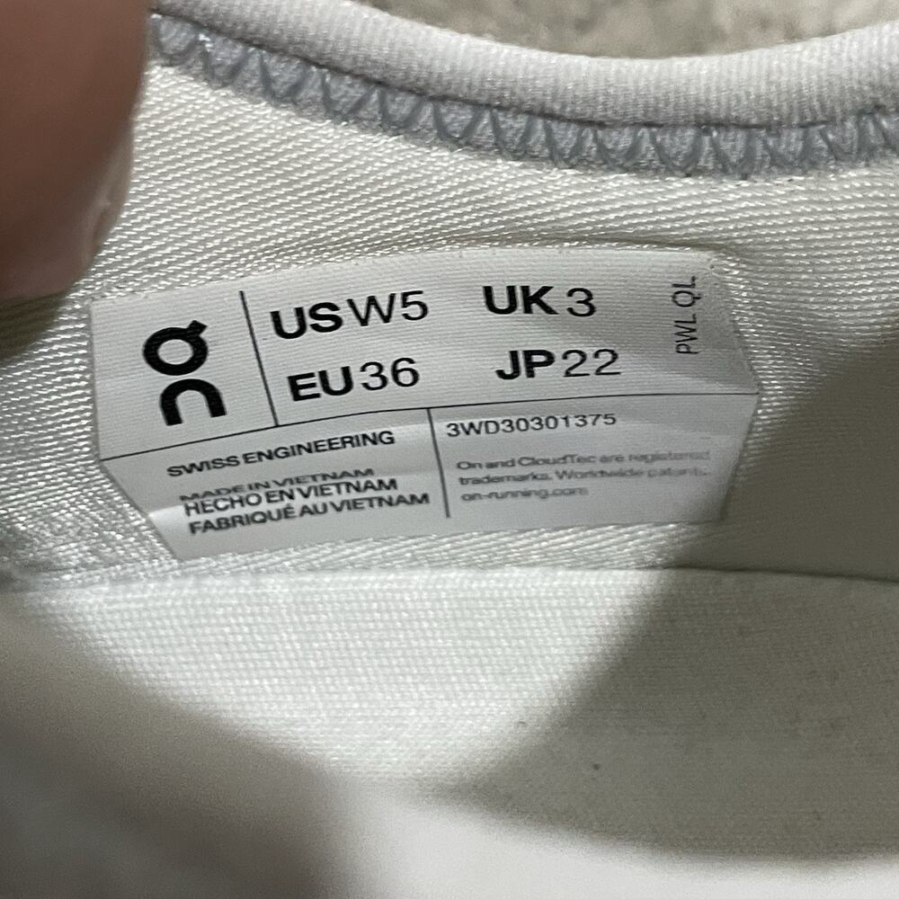 On Running Cloud Athletic Shoes in White with Light Purple Accents - Picture 8 of 9